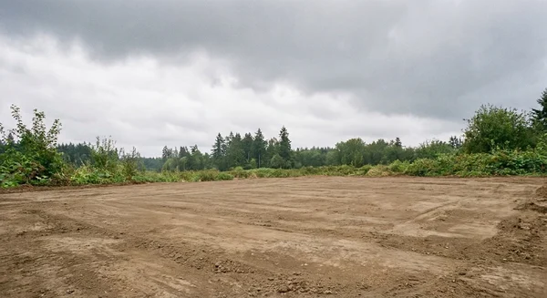 Cleared site after removal (service example)